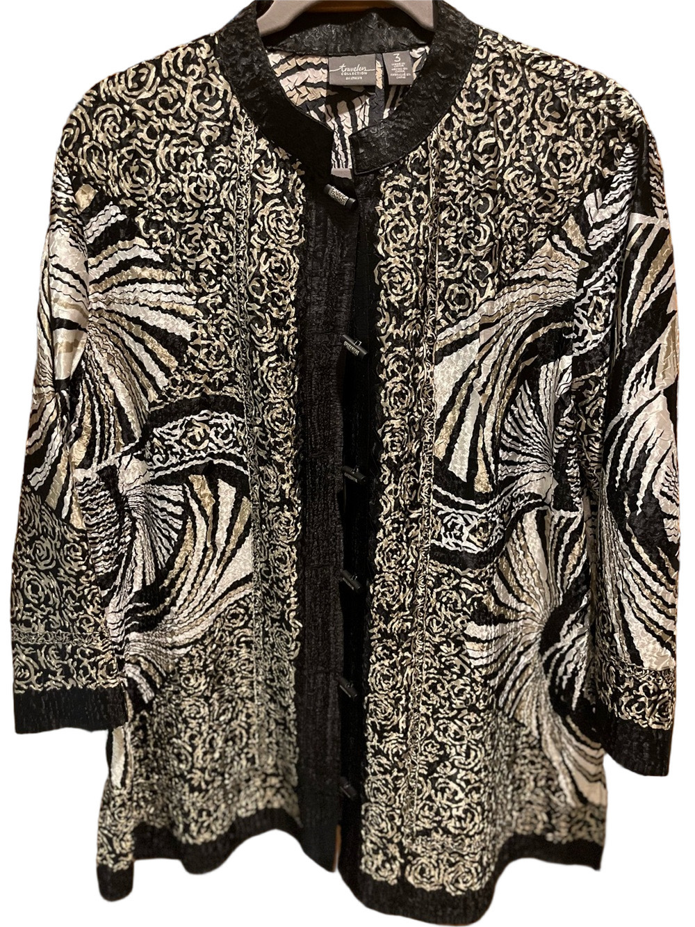 34. WOMENS CHICO’S TRAVELERS 3/XL DETAIL JACKET